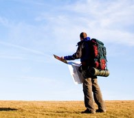 backpacker with map